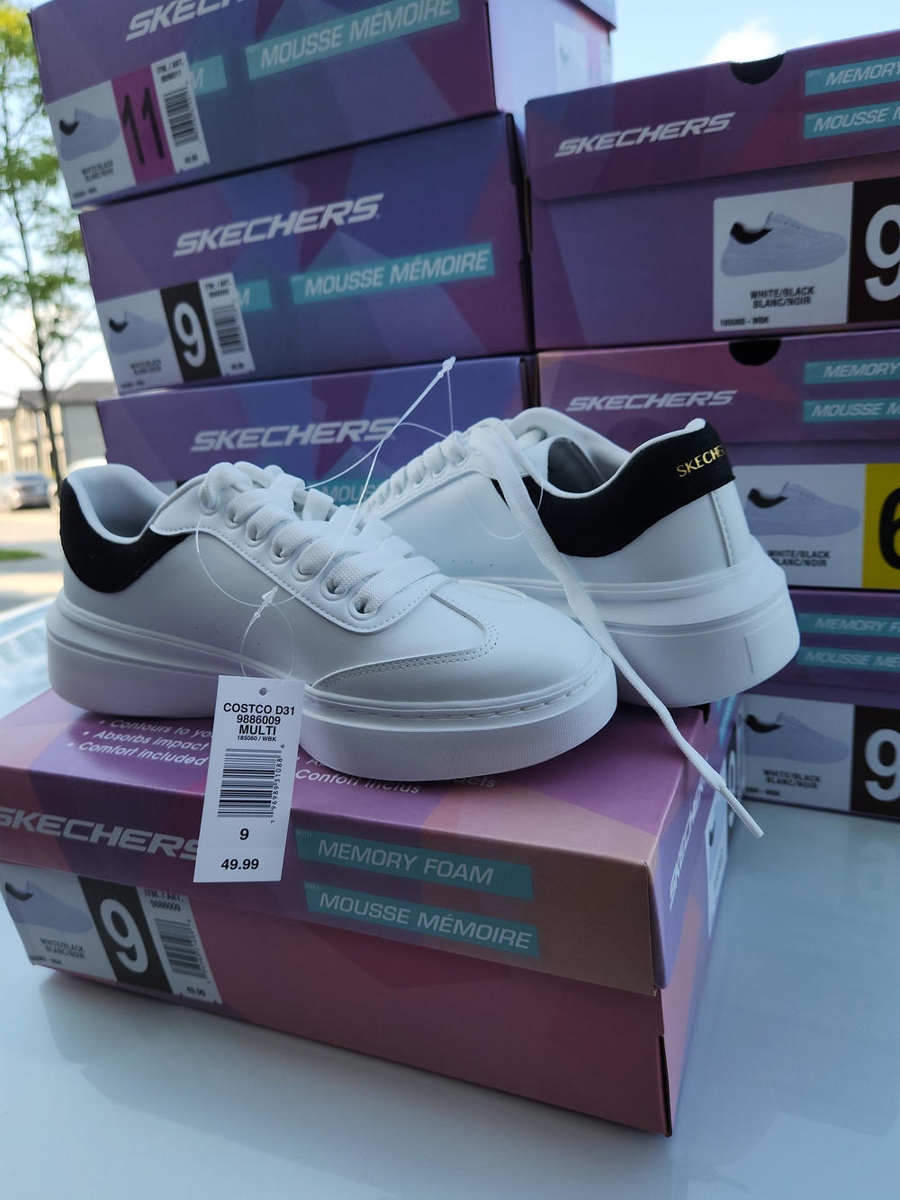 Skechers Men's White Sneakers with Black Heel Accent